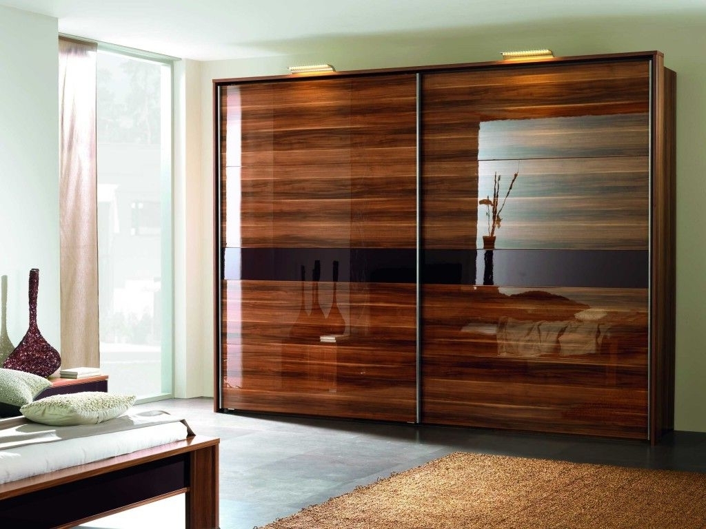 2017 Dark Wood Wardrobes With Sliding Doors For Create A New Look For Your Room With These Closet Door Ideas (View 1 of 15)