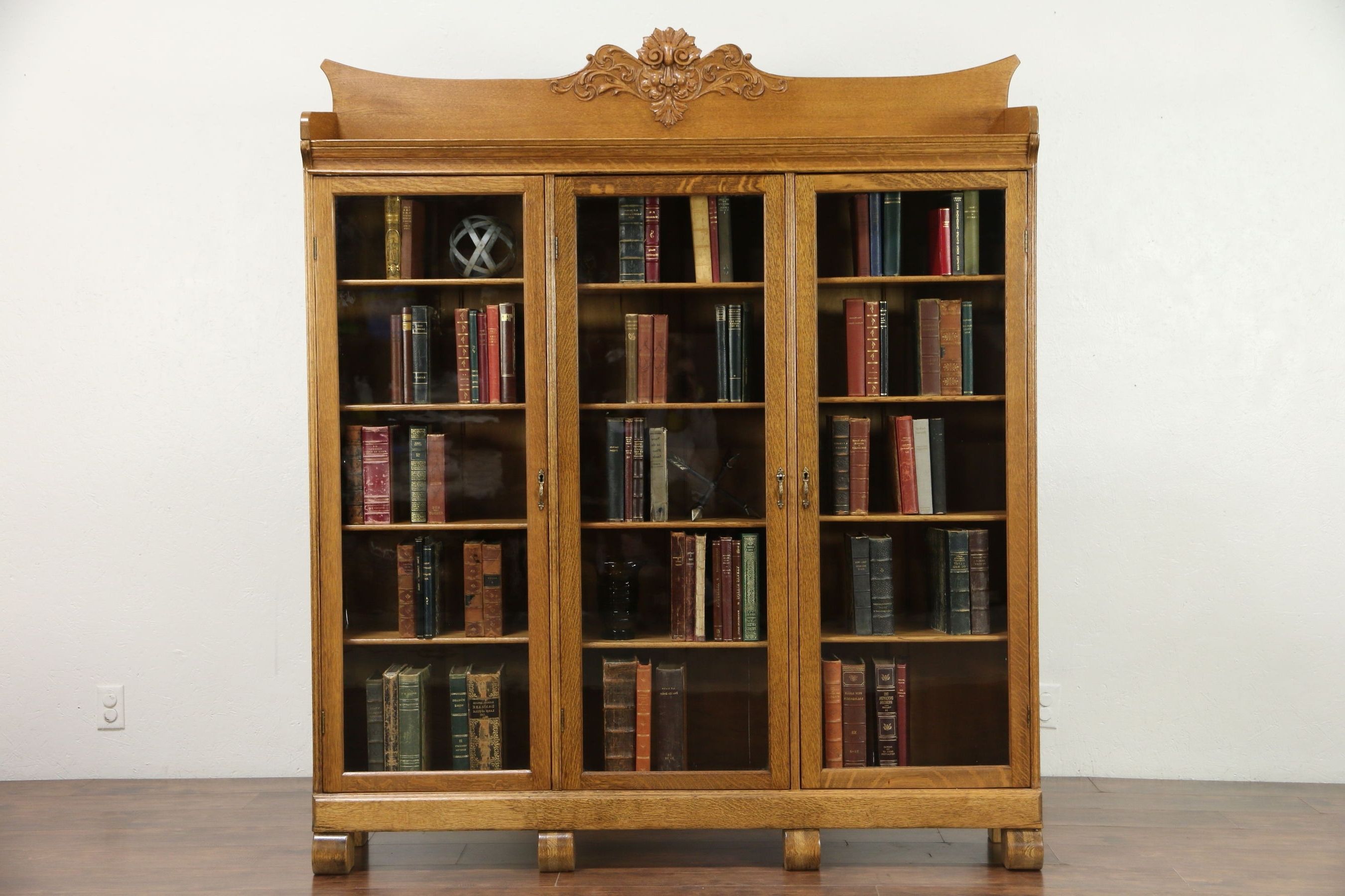 Antique Bookcases Intended For Most Up To Date Sold – Oak Triple Antique Bookcase, Carved Northwind Face, Wavy (View 1 of 15)