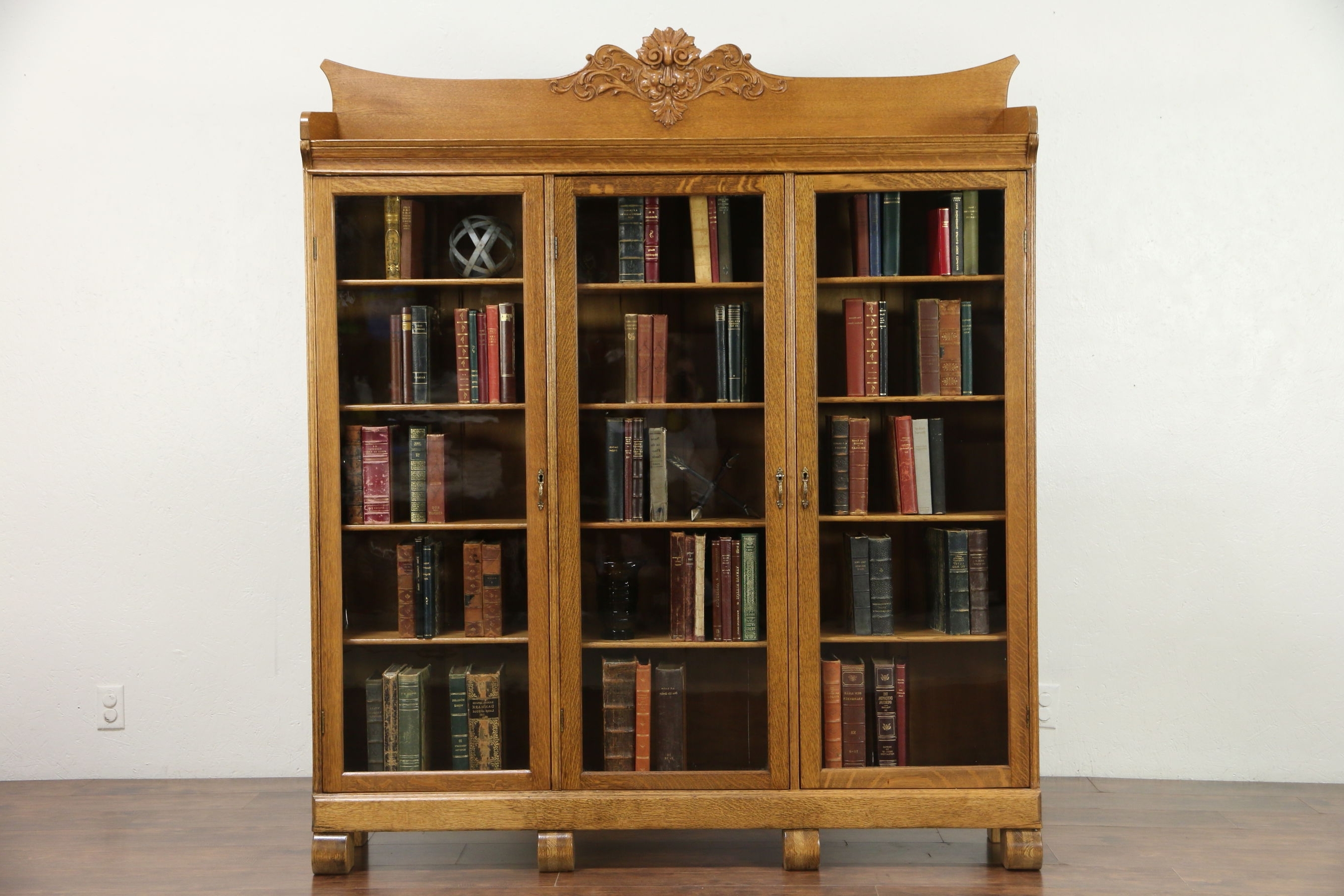 Antique Bookcases Intended For Most Up To Date Sold – Oak Triple Antique Bookcase, Carved Northwind Face, Wavy (Photo 1 of 15)