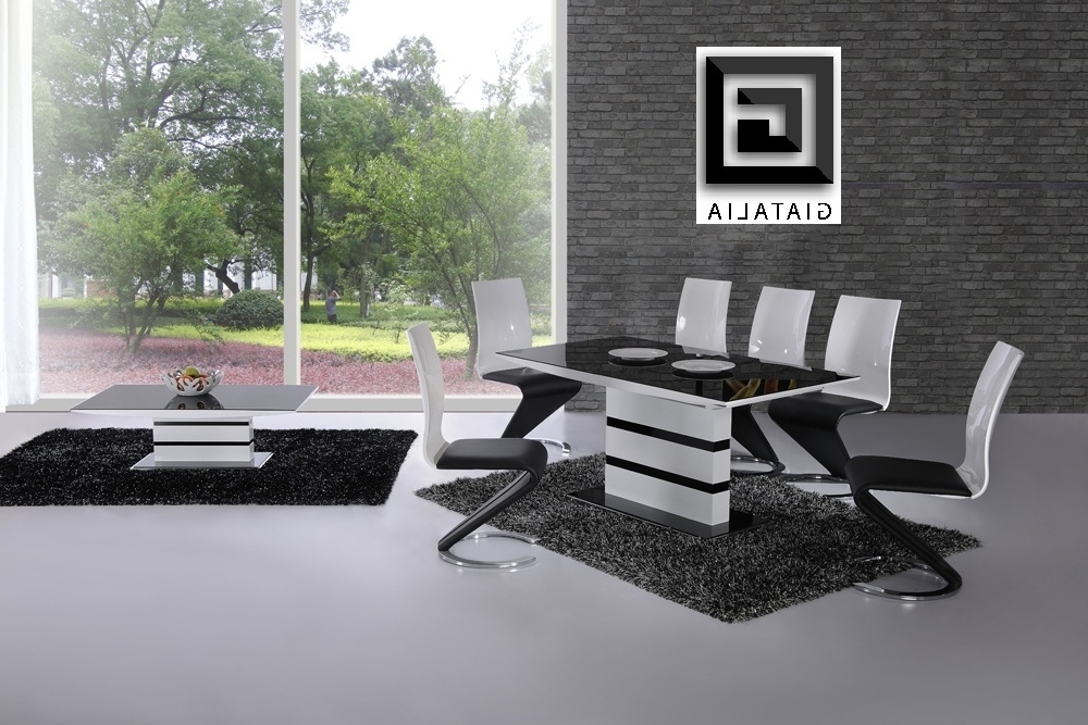 Latest Extending Glass Dining Tables And 8 Chairs Pertaining To K2 White & Black Glass Designer Extending Dining Table Only Or With (View 18 of 20)