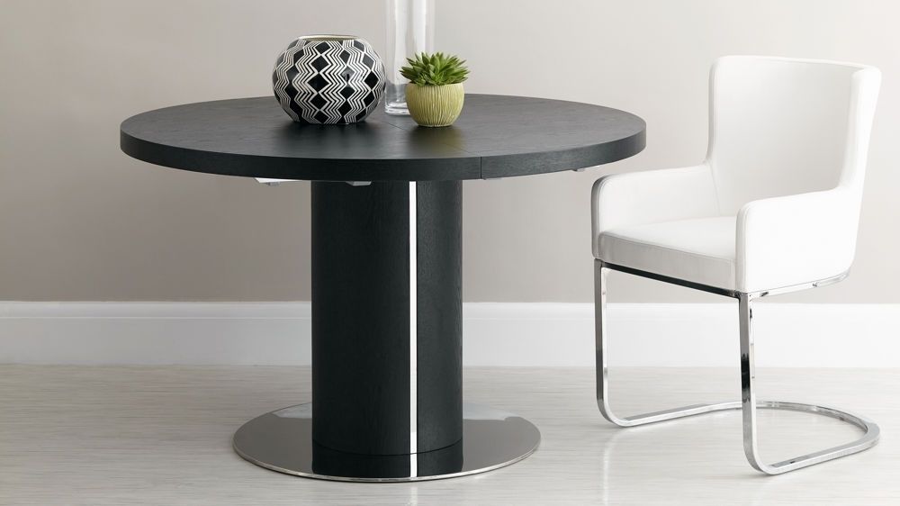 Well Known Black Ash Round Extending Dining Table (View 10 of 20)