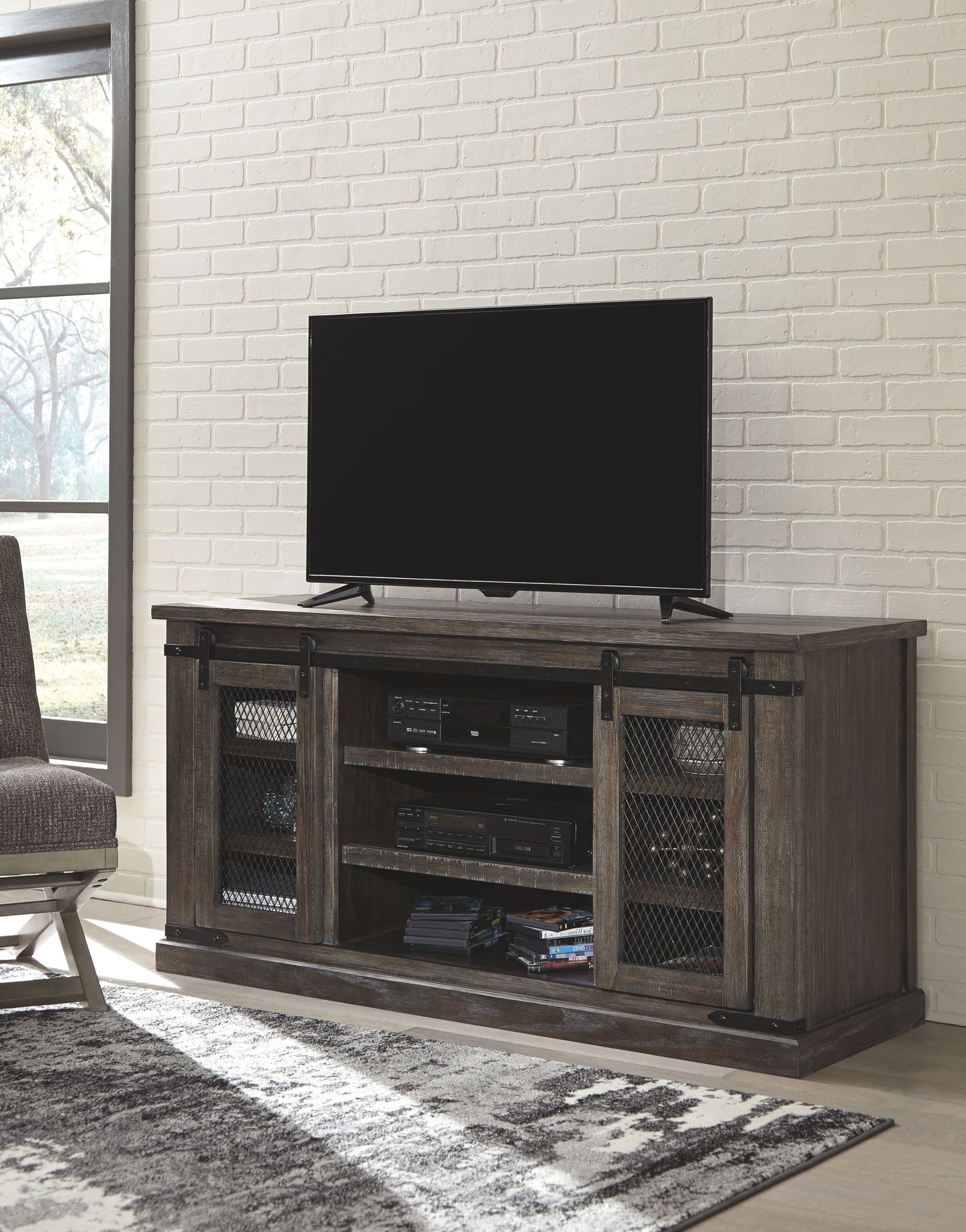 Well Liked Kado Corner Metal Mesh Doors Tv Stands Within Danell Ridge – Brown – Large Tv Stand (View 5 of 10)