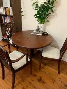 Famous Vintage Chiswell Extendable Round Dining Table With Throughout Vintage Brown Round Dining Tables (View 10 of 10)