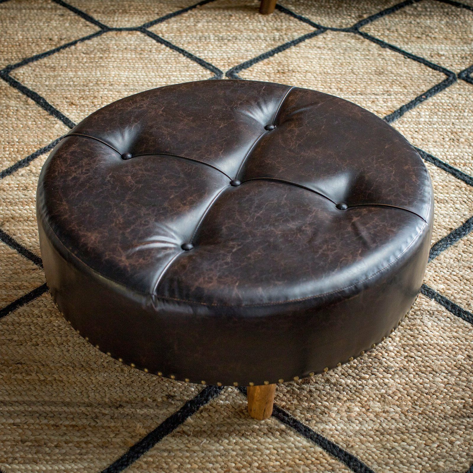 Newest Round Beige Faux Leather Ottomans With Pull Tab In Weathered Brown Faux Leather 31" Round Cocktail Ottoman Foot Stool W (View 7 of 10)