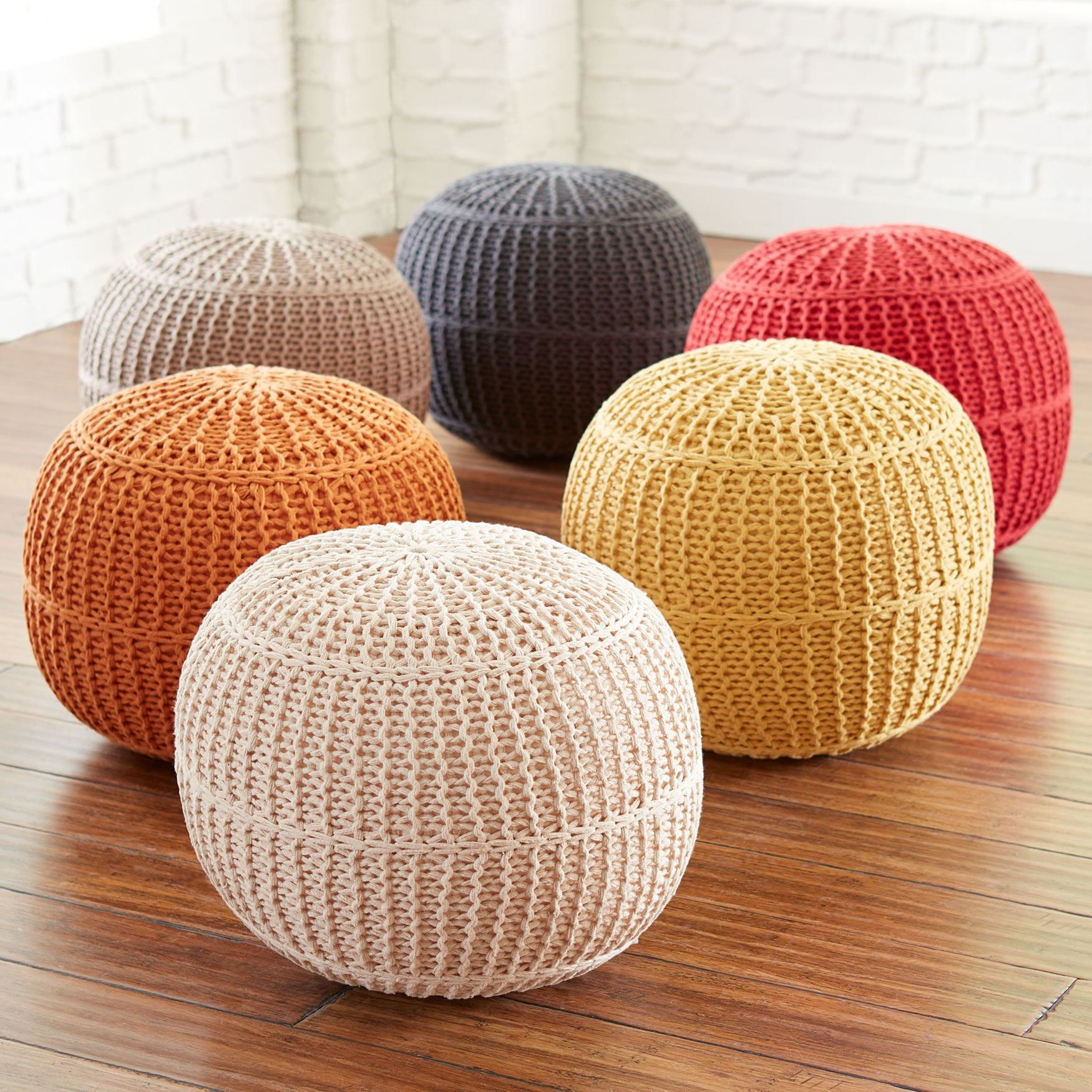 Perfect For Propping Your Feet Up, This Hand Knit Cotton Pouf Is Filled In 2017 Cream Cotton Knitted Pouf Ottomans (View 1 of 10)