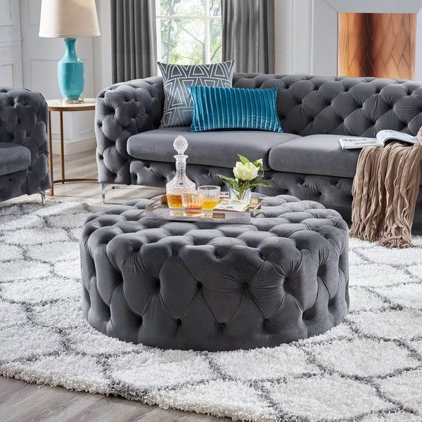 Shop Corvus Tufted Velvet Round Chesterfield Ottoman With Casters With Widely Used Cream Chevron Velvet Fabric Ottomans (View 5 of 10)