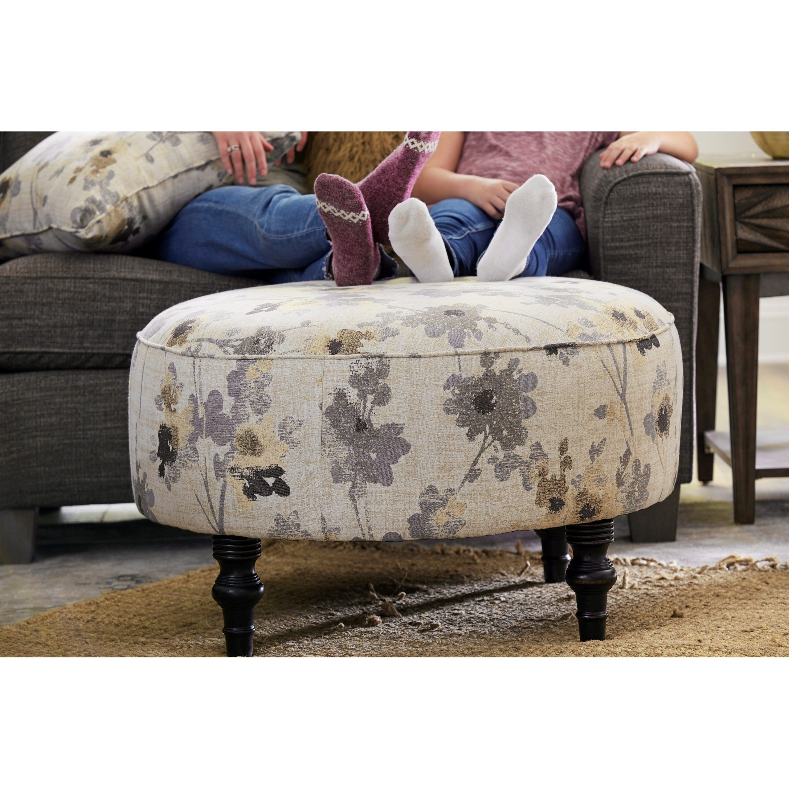 Well Known Best Home Furnishings Renae Transitional Round Cocktail Ottoman Regarding Gray And Cream Geometric Cuboid Pouf Ottomans (View 10 of 10)