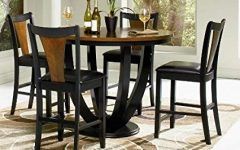 2024 Latest Caira Black 5 Piece Round Dining Sets with Upholstered Side Chairs
