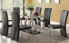 Glass Dining Tables and 6 Chairs