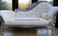 White Leather Chaise Lounges